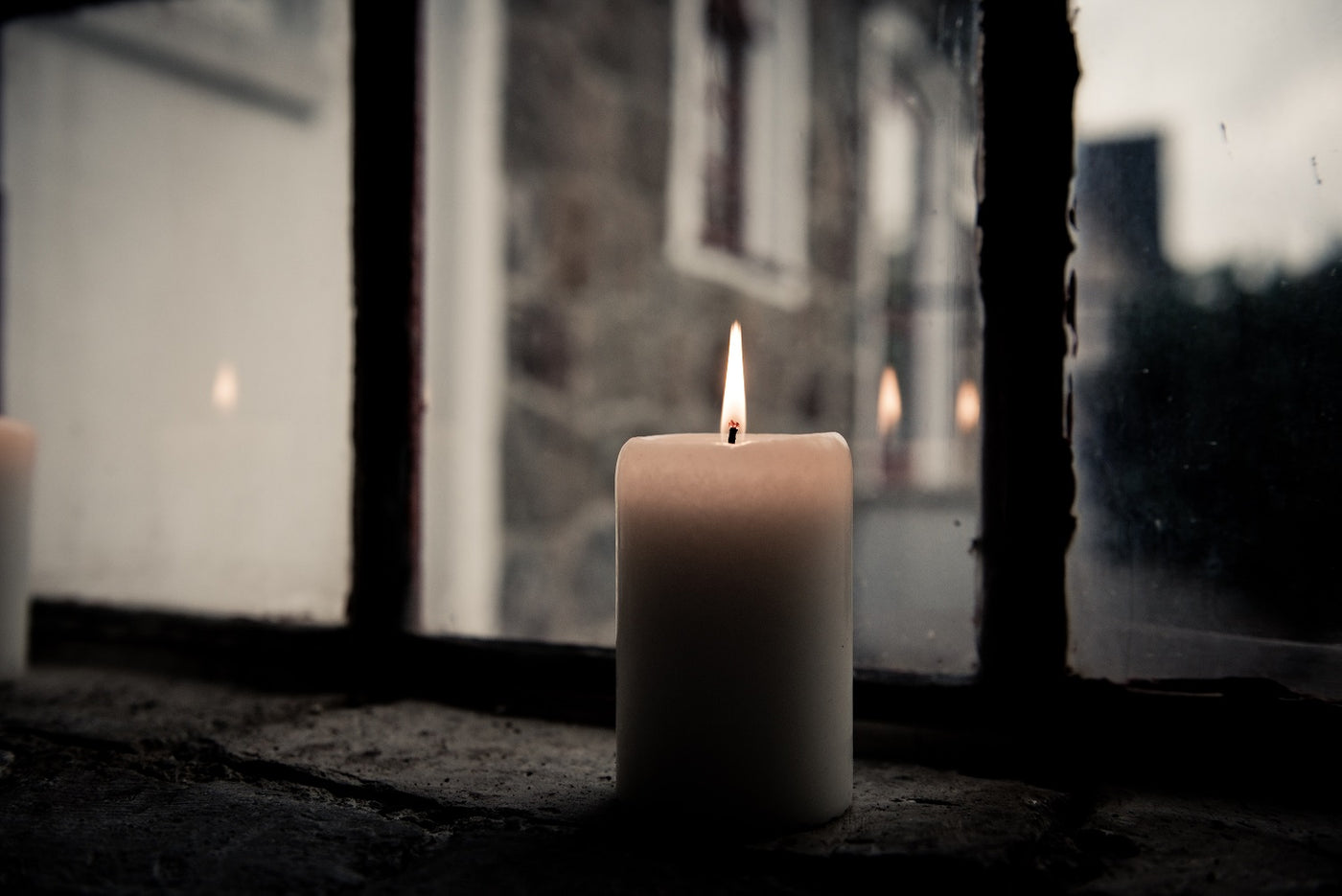 The candle behind the window
